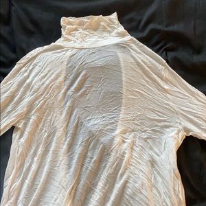 Backless white turtle neck sweater